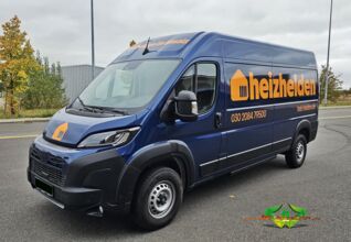 wrappsta.de-carwrapping-vollfolierung-peugeot_e_boxer-gloss_metallic_dark_blue-gloss_bright_orange-werbefolierung-08.jpg