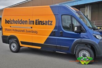 wrappsta.de-carwrapping-vollfolierung-peugeot_e_boxer-gloss_metallic_dark_blue-gloss_bright_orange-werbefolierung-14.jpg