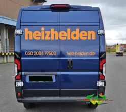wrappsta.de-carwrapping-vollfolierung-peugeot_e_boxer-gloss_metallic_dark_blue-gloss_bright_orange-werbefolierung-16.jpg