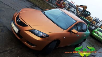 wrappsta.de_carwrapping-vollfolierung_mazda-3-emerald-green_blaze-orange_10.jpg