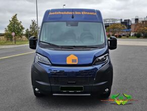 wrappsta.de-carwrapping-vollfolierung-peugeot_e_boxer-gloss_metallic_dark_blue-gloss_bright_orange-werbefolierung-13.jpg