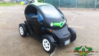 wrappsta.de_carwrapping-autofolierung_renault-twizy_matt-schwarz_gruen-carbon_03.jpg