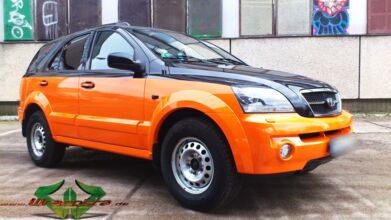 wrappsta.de_carwrapping-autofolierung_kia-sorento_neon-orange-glanz_scheibentoenung_03.jpg