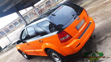wrappsta.de_carwrapping-autofolierung_kia-sorento_neon-orange-glanz_scheibentoenung_11.jpg