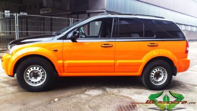 wrappsta.de_carwrapping-autofolierung_kia-sorento_neon-orange-glanz_scheibentoenung_08.jpg