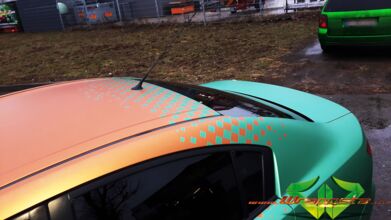 wrappsta.de_carwrapping-vollfolierung_mazda-3-emerald-green_blaze-orange_12.jpg
