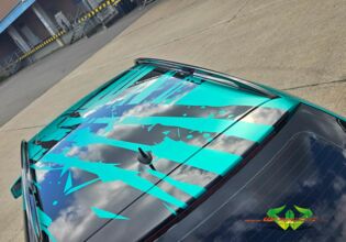 wrappsta.de-carwrapping-vollfolierung-mercedes_t_model-ultimate_black_gloss-emerald_green-23.jpg