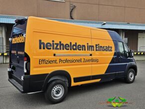 wrappsta.de-carwrapping-vollfolierung-peugeot_e_boxer-gloss_metallic_dark_blue-gloss_bright_orange-werbefolierung-04.jpg