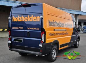 wrappsta.de-carwrapping-vollfolierung-peugeot_e_boxer-gloss_metallic_dark_blue-gloss_bright_orange-werbefolierung-15.jpg