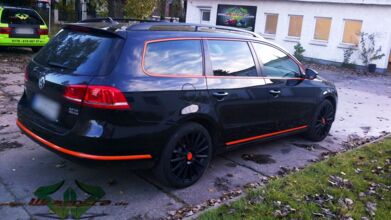 wrappsta.de_carwrapping-teilfolierung_vw-passat_orange_glanz-schwarz-leisten_10.jpg