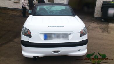 wrappsta.de_carwrapping-autofolierung_Peugeot-206-cc_glanz-weiss_schwarz-carbon_09.jpg