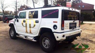 wrappsta.de_carwrapping-vollfolierung_hummer-h2_gold-chrome_03.jpg