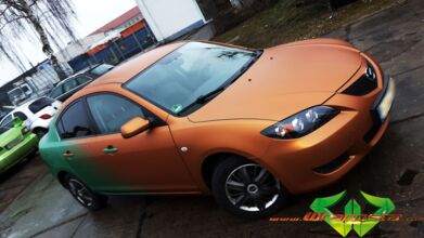 Mazda 3 - emerald green & blaze orange