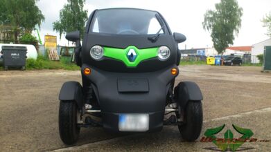 wrappsta.de_carwrapping-autofolierung_renault-twizy_matt-schwarz_gruen-carbon_04.jpg